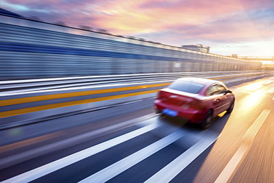 car driving down a road