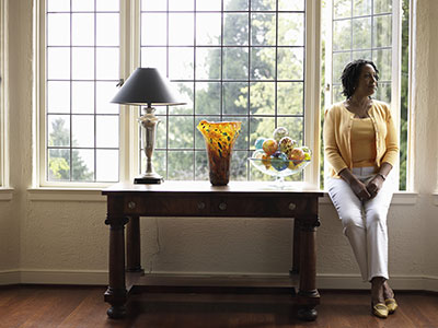 woman standing in her home