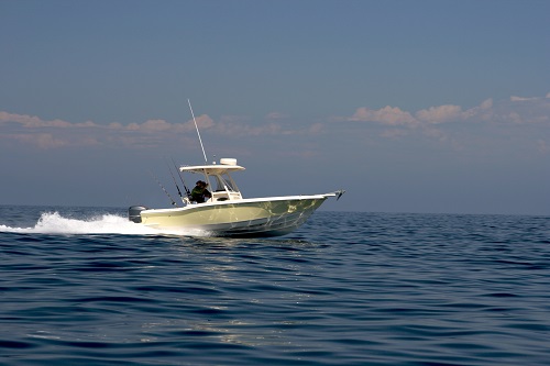 a small boat in a body of water