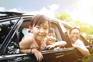 family inside a car